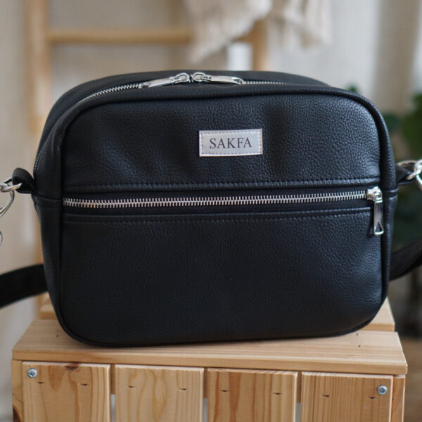 Listonoszka Sophie Black